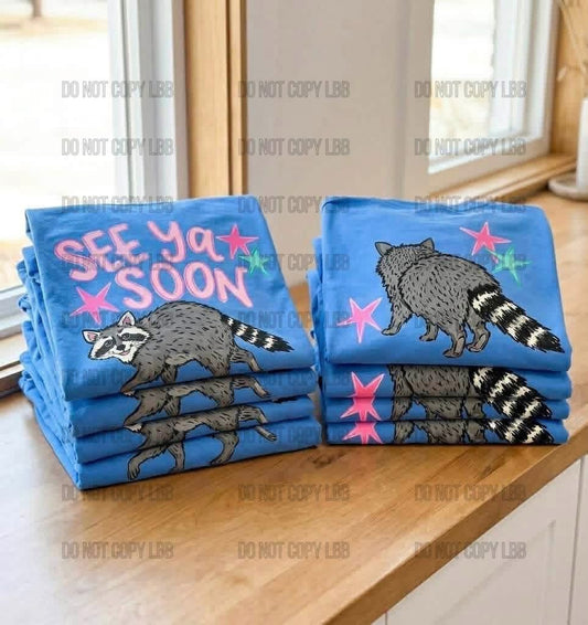 See Ya Soon Raccoon double sided tee pre order